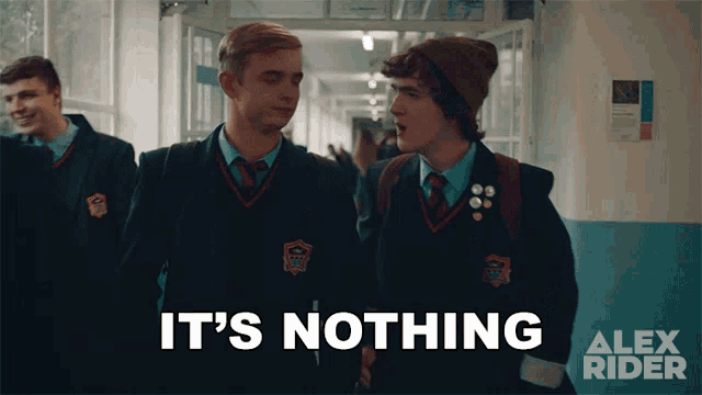 two boys walking down a hallway with the words it 's nothing on the bottom