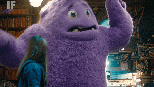a purple stuffed animal is standing next to a girl with the word if on the bottom right