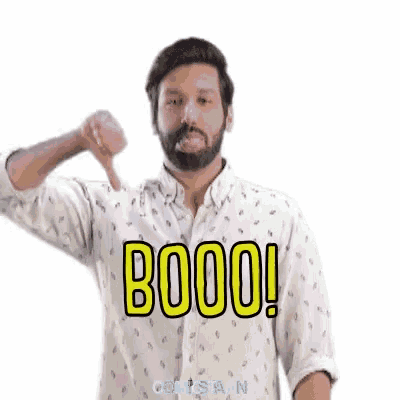 a man with a beard is giving a thumbs down sign while wearing a shirt that says booo