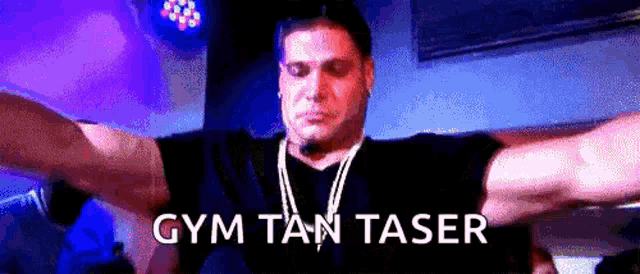 a man with his arms outstretched and the words gym tan taser written below him