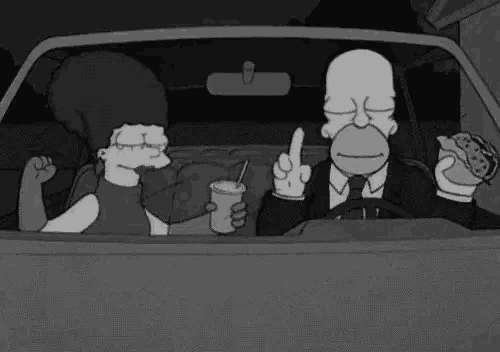 homer simpson is driving a car with bart simpson and marge simpson in the back seat .