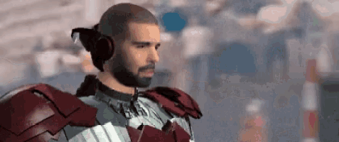 a man with a beard wearing headphones and a superhero costume
