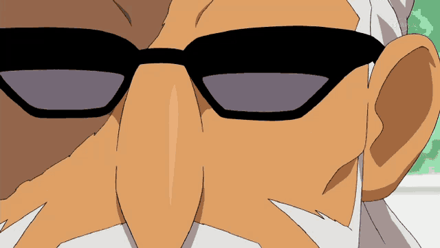 a close up of a man 's face with sunglasses