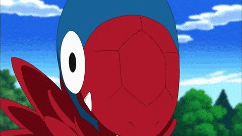a red cartoon character with a blue helmet on its head
