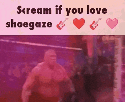 a man is screaming if you love shoegaze while holding a guitar .