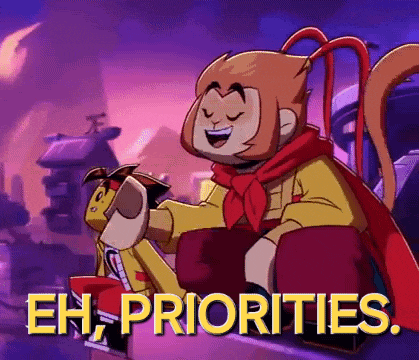 a cartoon monkey is sitting on a box with the words `` eh , priorities '' written above him .