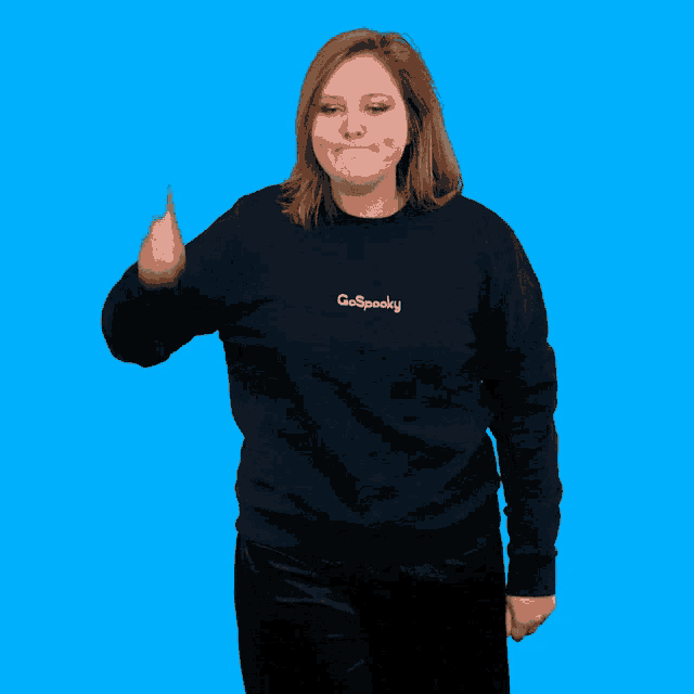 a woman wearing a black sweatshirt that says chillyweeky