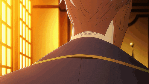 a close up of a man 's neck in a room