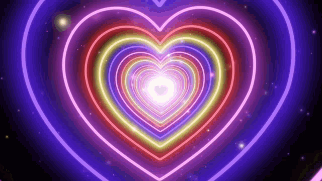 a rainbow of neon hearts glowing in the dark on a purple background .
