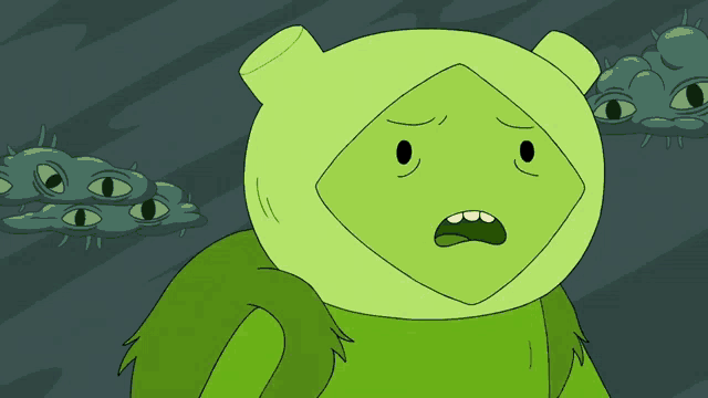 a green cartoon character with a surprised expression