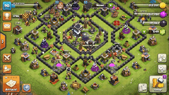a screen shot of a clash of clans game with a few buildings
