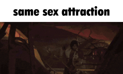 a picture of a man kissing another man with the words same sex attraction above it