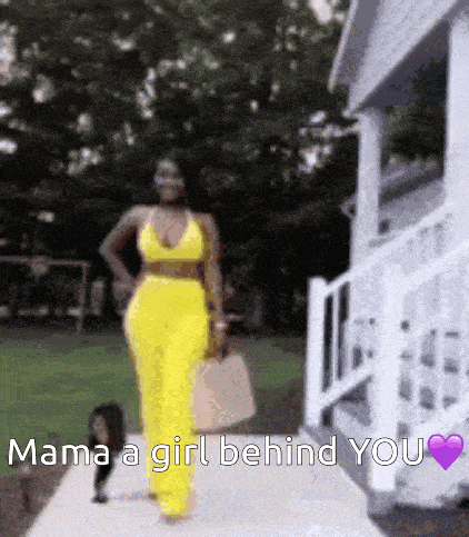 a woman in a yellow outfit walking down a sidewalk with the words mama a girl behind you
