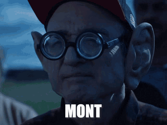 a man wearing glasses and a hat says mont lyaaaa