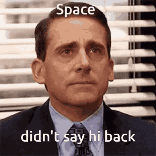 a man in a suit and tie with the words space did n't say hi back