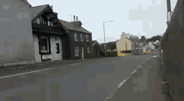 a street with a few houses and a sign that says ' a few houses '
