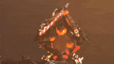 a cartoon explosion with a sad face on the screen