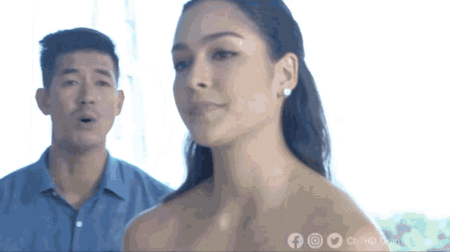 a man and a woman are standing next to each other on a screen that says chn hd