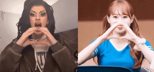 a drag queen making a heart with her hands next to a girl in a blue shirt
