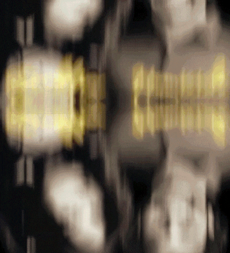 a blurred image of a person 's face with the word christmas written on it