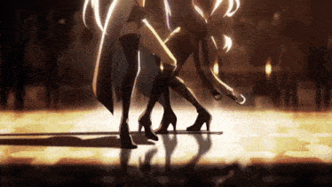 a couple of anime girls are dancing together on a stage .