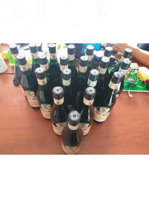 a bunch of bottles of fernet branca are on a table