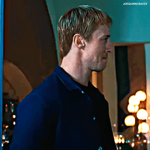 a close up of a man 's face with the words joequinncraves above him