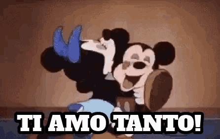 a cartoon of mickey mouse and minnie mouse with the words ti amo tanto