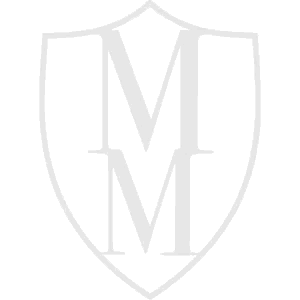 a black and white shield with the letter m on it