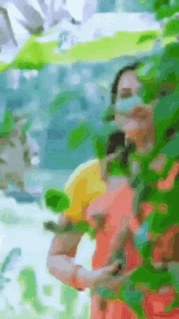 a blurry picture of a woman holding a yellow object