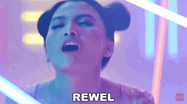 a woman with her eyes closed and the word rewel behind her