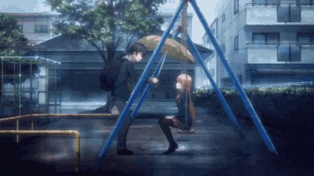 a boy and a girl on a swing with an umbrella