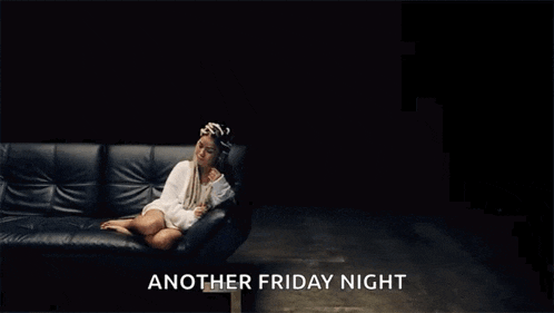 a woman is laying on a black couch with the words another friday night above her
