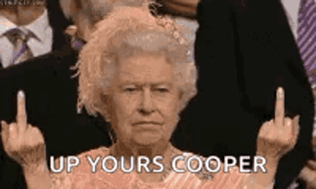 the queen is giving the middle finger to a man in a suit .