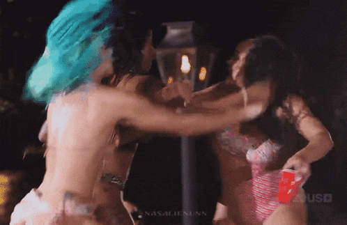 a group of women are dancing in front of a sign that says ' nasalie nunn '