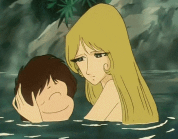 a woman with long blonde hair is standing next to a boy in a bathtub