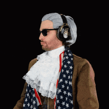 a man wearing a wig and headphones is wearing an american flag scarf around his neck