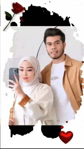 a man and a woman are posing for a picture and the woman is wearing a hijab
