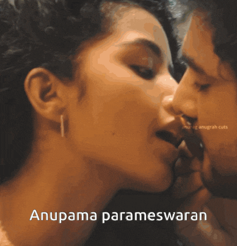 a man and a woman kissing with the words anupama parameswaran above them