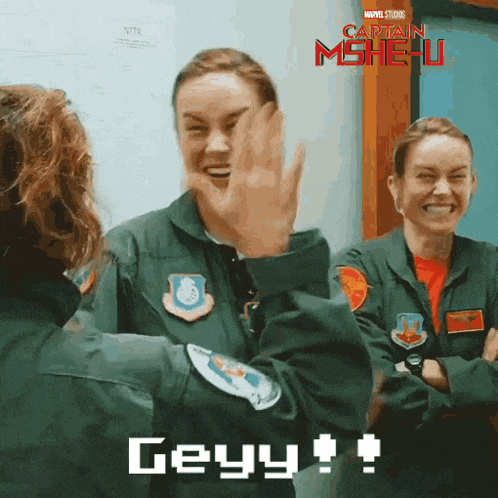 a poster for captain marvel shows a group of women in military uniforms