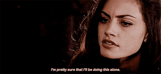 a woman is saying i 'm pretty sure that i 'll be doing this alone while looking at something .