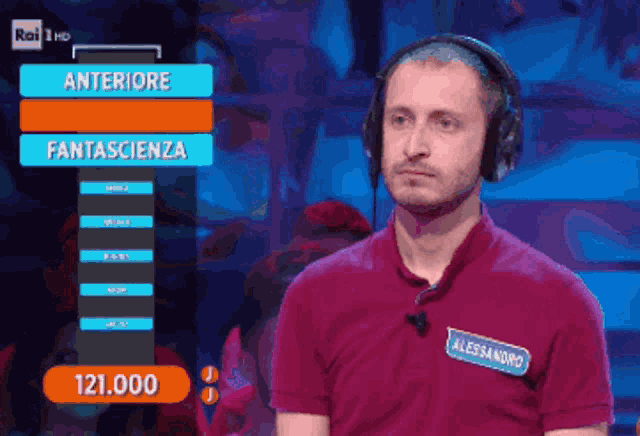 a man wearing headphones and a name tag that says alessandra on it