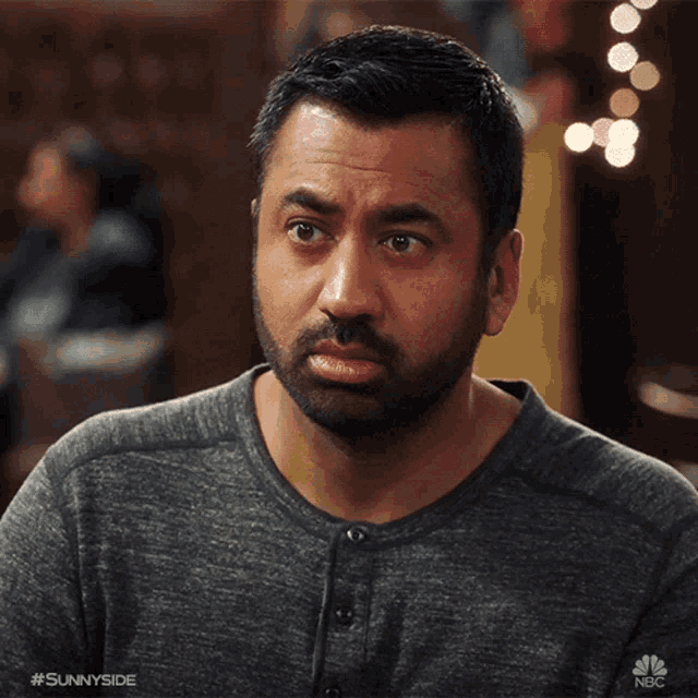 a close up of a man 's face with the hashtag #sunnyside at the bottom