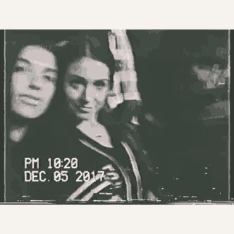 a black and white photo of two women taken on december 5 2017 .