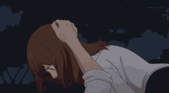 a woman laying down with her head on someone 's shoulder with tokyo mx 1 written on the bottom