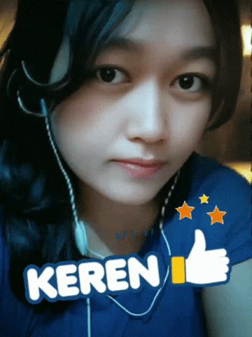 a girl wearing headphones has a sticker that says keren on it