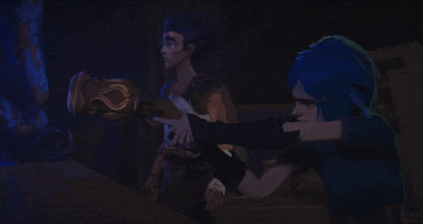 a man and a woman with blue hair are standing in a dark room .