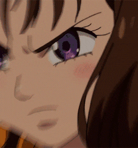 a close up of a girl 's face with a purple eye