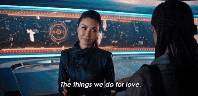 a woman says the things we do for love while holding another woman 's hand