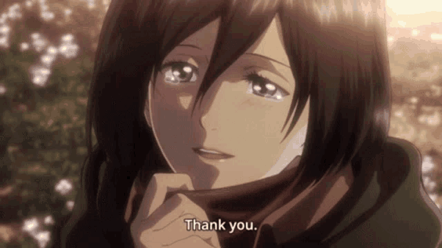 a girl with a scarf around her neck is saying " thank you "